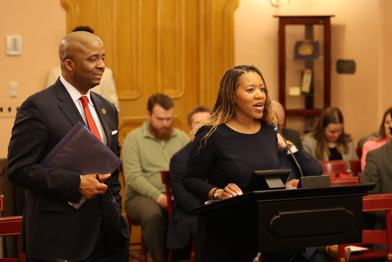 State Rep. Desiree Tims (D-Dayton) introduces House Bill 545, in regards to school busing, while co-sponsor Phillip Robinson Jr., D-Solon, looks on. Courtesy of Desiree Tims