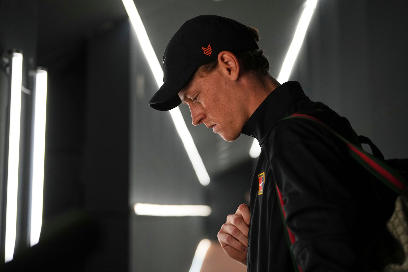 Italy's Jannik Sinner looks down upon his arrival for the second round match against Argentina's Mariano Navone, at the Italian Open tennis tournament in Rome, Saturday, May 10, 2025. (AP Photo/Andrew Medichini)