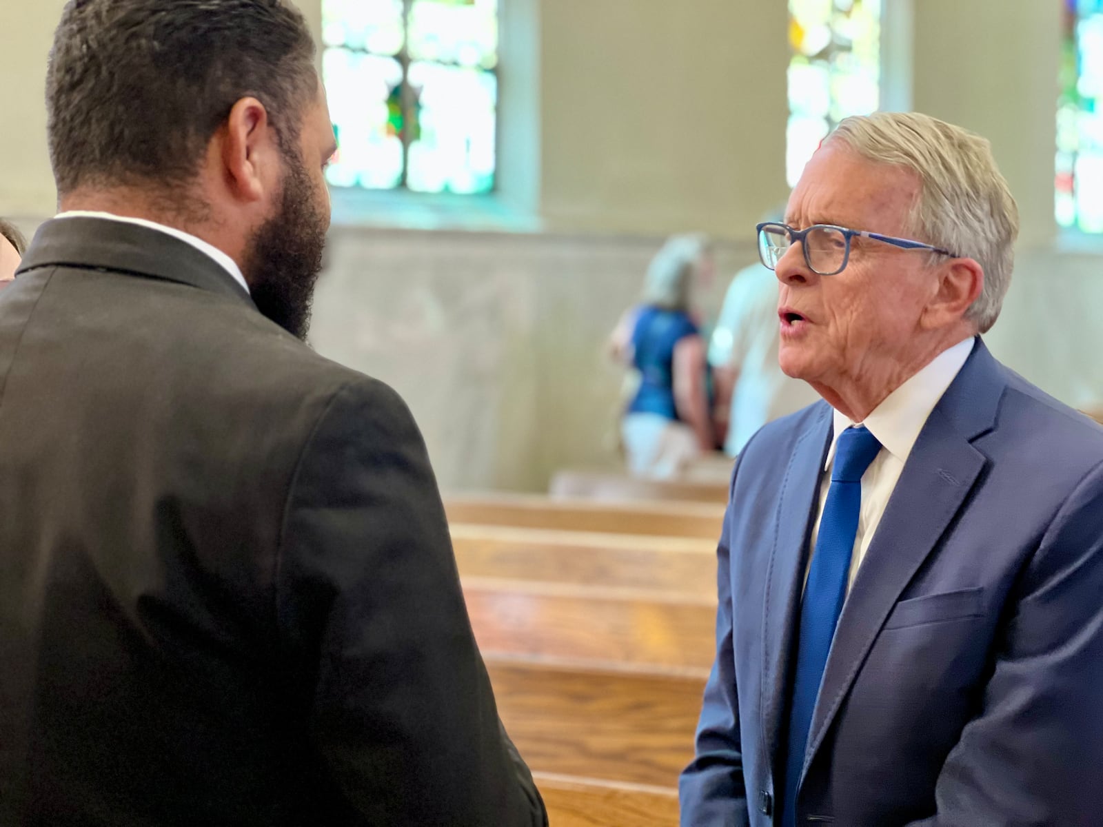 Gov. Mike DeWine attended Mass lead by Archbishop of Cincinnati Robert Casey at St. Raphael Church in Springfield on Sunday. AIMEE HANCOCK/STAFF