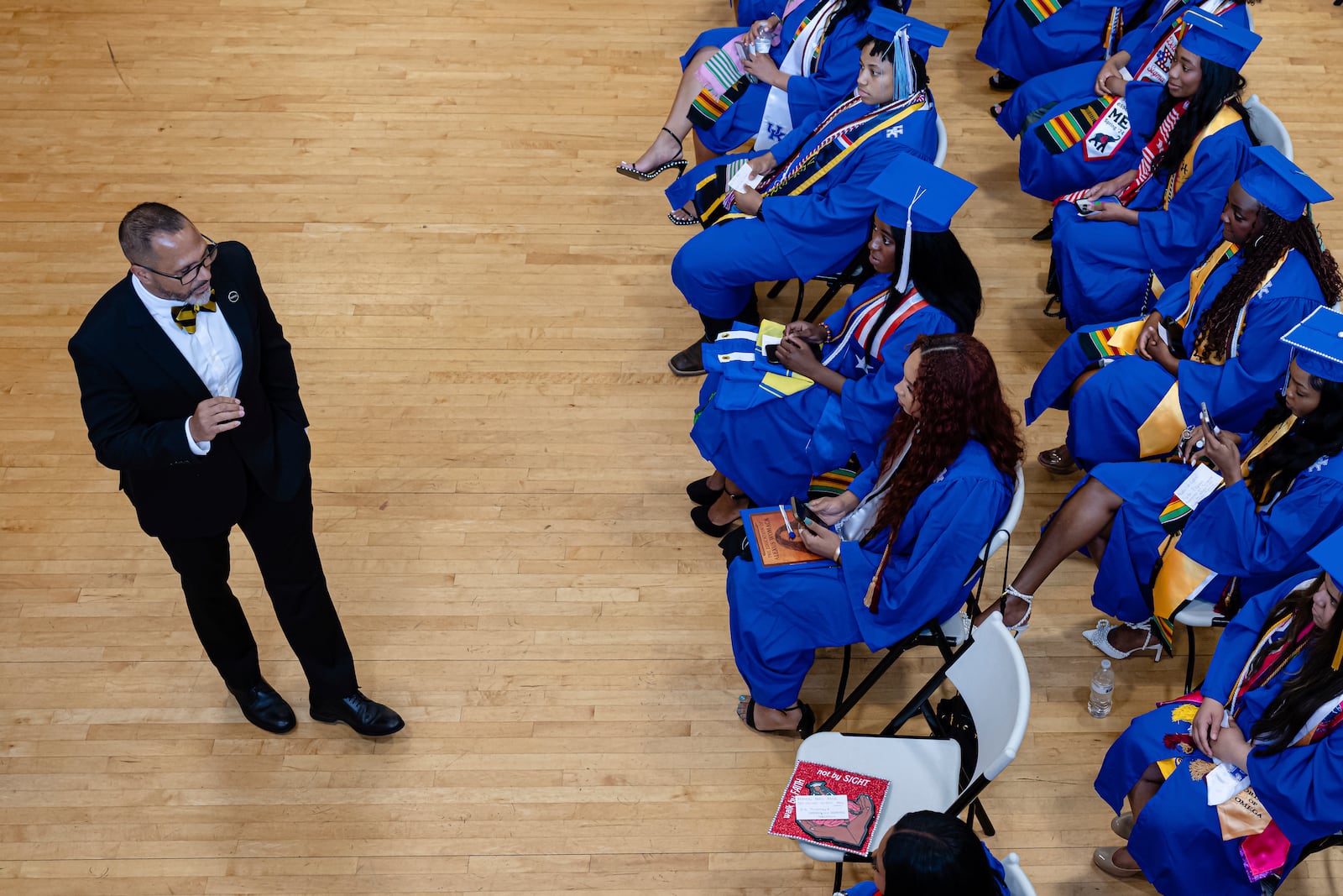 Christian Adair explains the run of show to graduates ahead of the Senior Salute at Lyric Theatre in Lexington, Kentucky, Wednesday, May 7, 2025. (AP Photo/Jon Cherry)