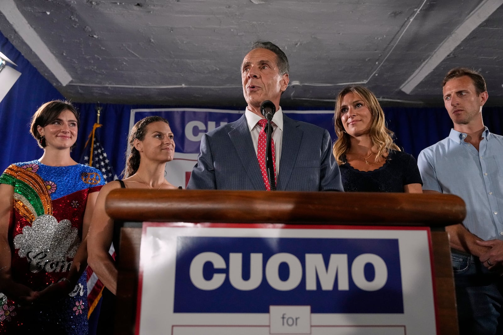 Joined by his daughters, from left, Michaela Kennedy-Cuomo, Cara Kennedy-Cuomo, Mariah Kennedy-Cuomo and son-in-law Tellef Lundevall, mayoral candidate Andrew Cuomo, center, speaks to supporters during a Democratic primary watch party, Tuesday, June 24, 2025, in New York. (AP Photo/Yuki Iwamura)