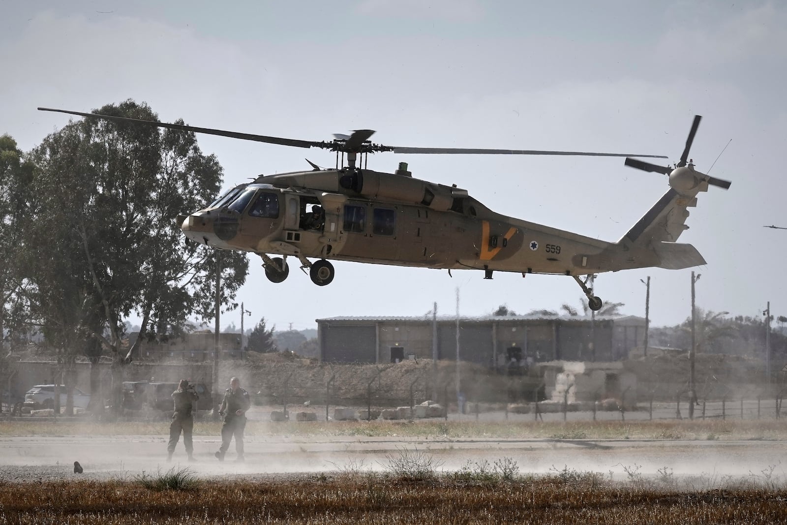 A military helicopter carrying relatives of Israeli-American soldier Edan Alexander lands ahead of his scheduled release from Hamas captivity in Gaza, in Reim, near the Gaza border, southern Israel, Monday, May 12, 2025.(AP Photo/Maya Alleruzzo)