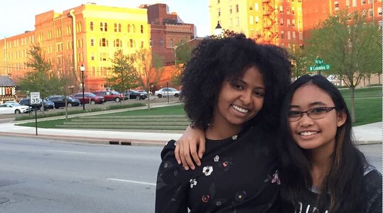 Mariam Ghebregergis, from Germany, and her host sister, Impreza Izzy Rogers stand together in Springfield in May.