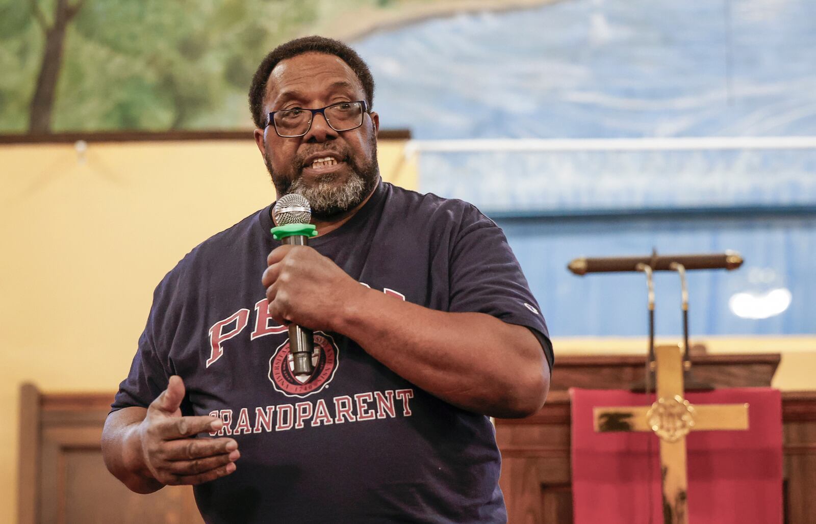 Pastor Michael Young speaks during a community safety meeting "Be a Neighbor: Building a Better Springfield for All" hosted by the Amos Project on Thursday, Jan. 29, 2026, at Zion Hill Baptist Church. Organizers gathered to give tools and guidance with expected ICE activity after the Temporary Protected Status expires on Tuesday, Feb. 3, 2026. JOSEPH COOKE/STAFF