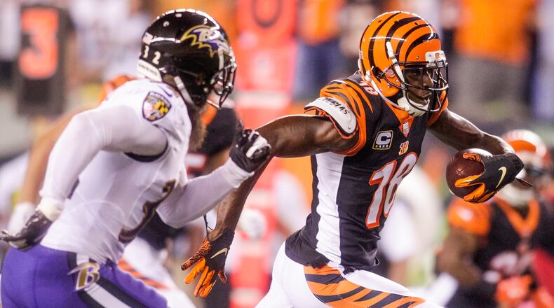 Cincinnati Bengals wide receiver A.J. Green carries the ball in for a touchdown during their game against the Baltimore Ravens Thursday, Sept. 13 at Paul Brown Stadium in Cincinnati. The Cincinnati Bengals defeated the Baltimore Ravens 34-23. NICK GRAHAM/STAFF