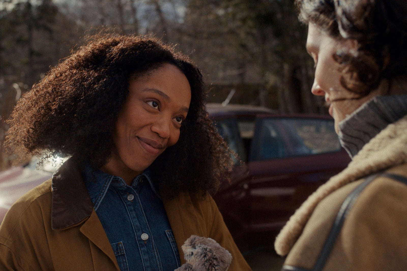 This image released by A24 shows Naomi Ackie, left, and Eva Victor in a scene from "Sorry, Baby." (A24 via AP)
