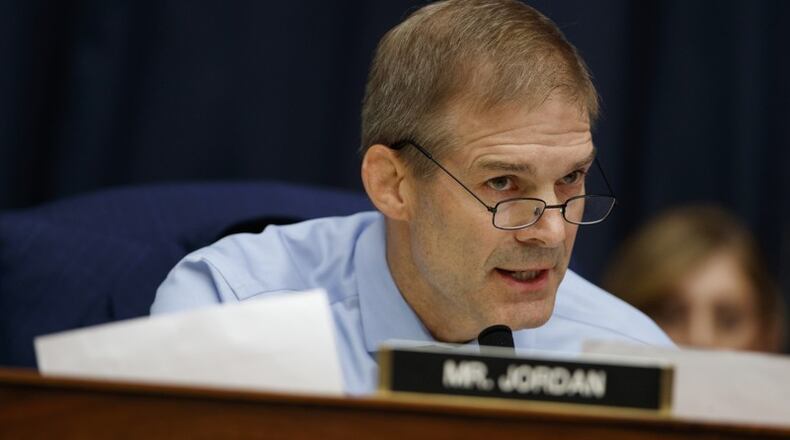 In this Thursday, July 12, 2018, photo, Rep. Jim Jordan, R-Ohio, questions FBI Deputy Assistant Director Peter Strzok during the House Committees on the Judiciary and Oversight and Government Reform hearing on “Oversight of FBI and DOJ Actions Surrounding the 2016 Election,” on Capitol Hill in Washington. Jordan, who coached wrestling at Ohio State University, has been interviewed by the law firm investigating allegations that a now-dead team doctor sexually abused male athletes there decades ago. Jordan’s spokesman says the congressman spoke Monday, July 16, 2018, with the firm looking into allegations against Dr. Richard Strauss and how the school responded to any complaints about Strauss. (AP Photo/Evan Vucci, File)