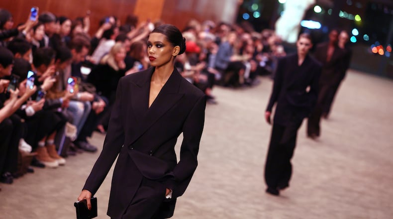Models wear creations from the Saint Laurent Fall/Winter 2026-2027 Women's collection presented in Paris, Tuesday, March 3, 2026. (AP Photo/Tom Nicholson)