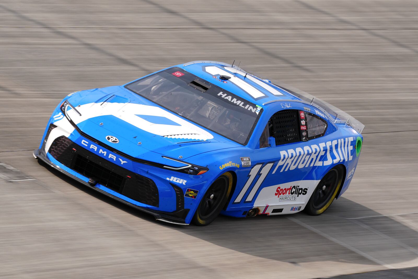 Denny Hamlin drives through Turn 2 during a NASCAR Cup Series auto race at Dover Motor Speedway, Sunday, July 20, 2025, in Dover, Del. (AP Photo/Derik Hamilton)