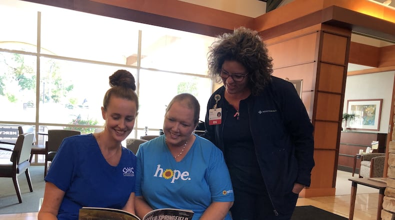 Christine Swinford, center, recently became a breast cancer survivor with help from Mercy Health Springfield Regional Cancer Center and infusion nurse Stephanie Bonomo, left, and breast health navigator Tracy Adrian. BRETT TURNER/CONTRIBUTED
