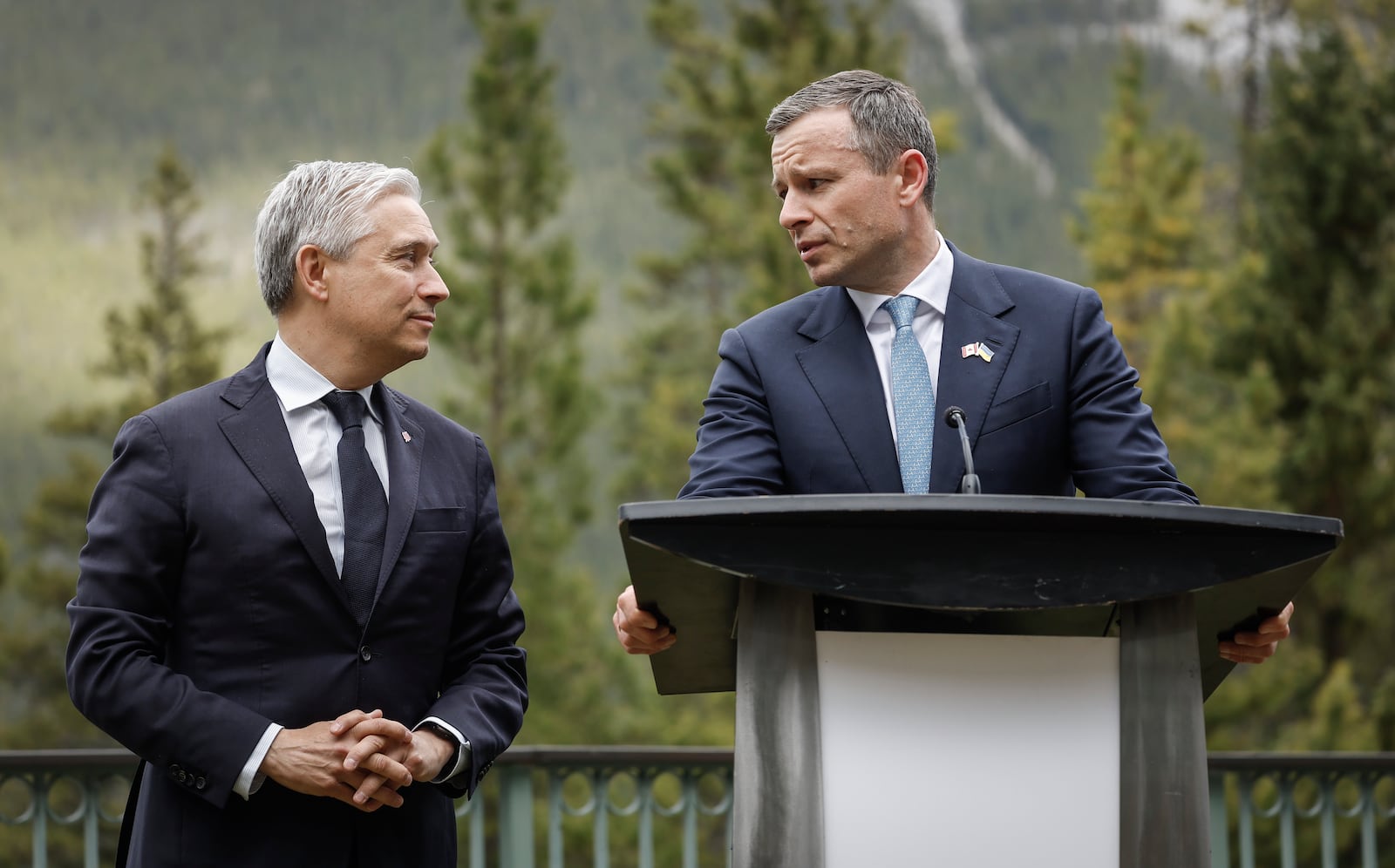Ukraine Minister of Finance, Sergii Marchenko, right, and Canada's Finance Minister Francois-Philippe Champagne speak to the media prior to the G7 Finance Ministers meeting in Banff, Alberta, Tuesday, May 20, 2025. (Jeff McIntosh/The Canadian Press via AP)