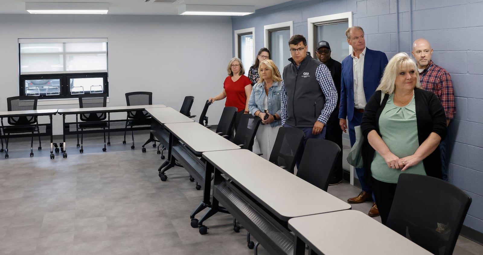 Visitors tour a room during the grand reopening of the $4.6M renovation project of the Home Road campus of the Clark County Department of Job and Family Services on Wednesday, August 20, 2025, in Springfield. JOSEPH COOKE/STAFF

