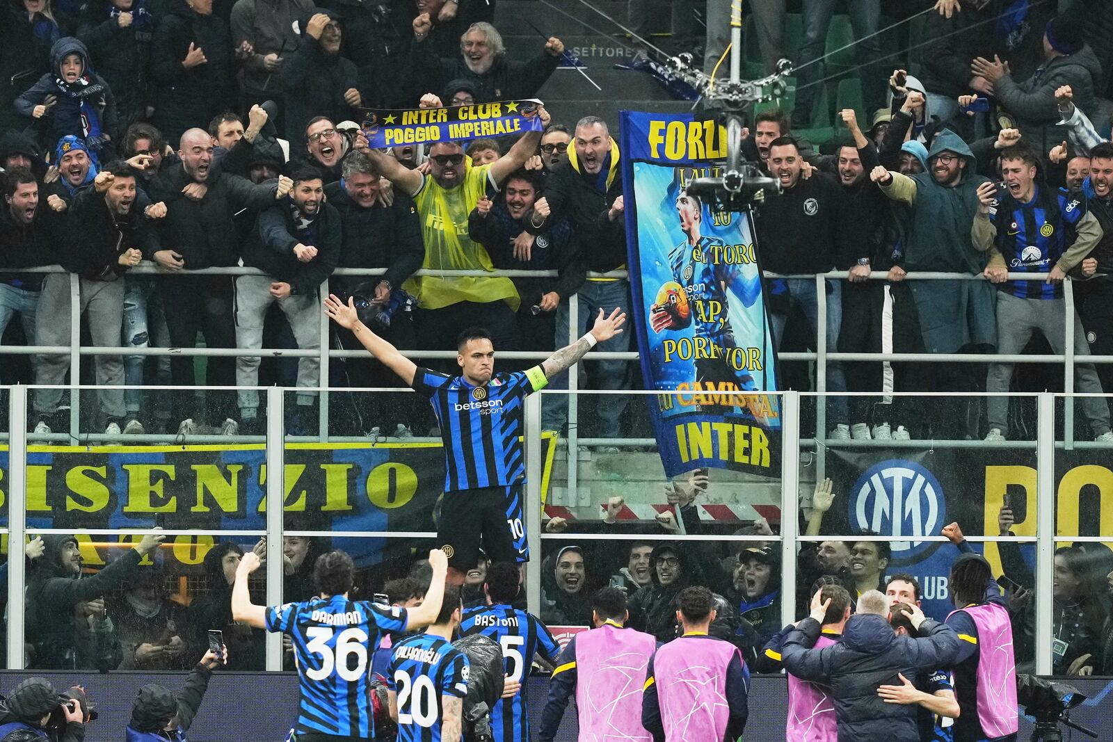 Inter Milan's Lautaro Martinez celebrates after scoring his side's opening goal during the Champions League quarterfinal second leg soccer match between Inter Milan and Bayern Munich at the San Siro stadium in Milan, Italy, Wednesday, April 16, 2025. (AP Photo/Antonio Calanni)
