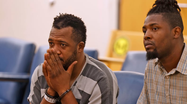 Hermanio Joseph, left, sits with interpreter, Sony Auguste, as he's arraigned in Clark County Municipal Court Thursday, August 24, 2023. Joseph is charged with vehicular homicide for causing the fatal Northwestern school bus crash on Tuesday. BILL LACKEY/STAFF
