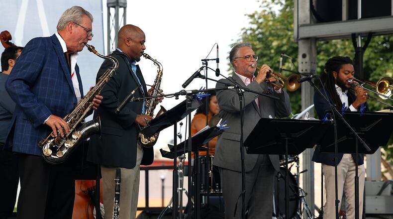 Todd Stoll, center, is helping organize acts and will perform at the 2025 Springfield Jazz and Blues Festival in downtown Springfield on Aug. 8-9. BILL LACKEY/STAFF