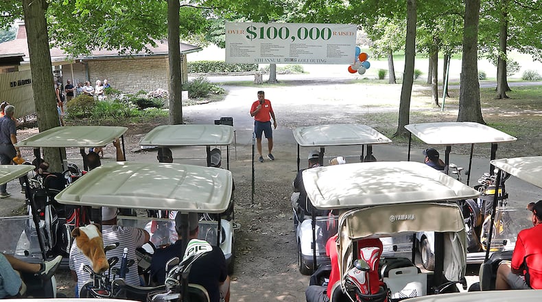 Dozens of golfers wait in their carts for the beginning of the 8th annual KB&P Financial Partners Charity Invitational golf outing at Reid Park Golf Course in Clark County Friday, Sept. 16, 2022. The annual event has raised over $100,000 for local charities. BILL LACKEY/STAFF