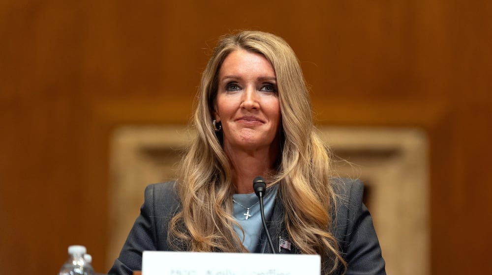 FILE - Small Business Administration administrator Kelly Loeffler listens during a hearing of the Senate Committee on Capitol Hill, May 21, 2025, in Washington. (AP Photo/Mark Schiefelbein, File)