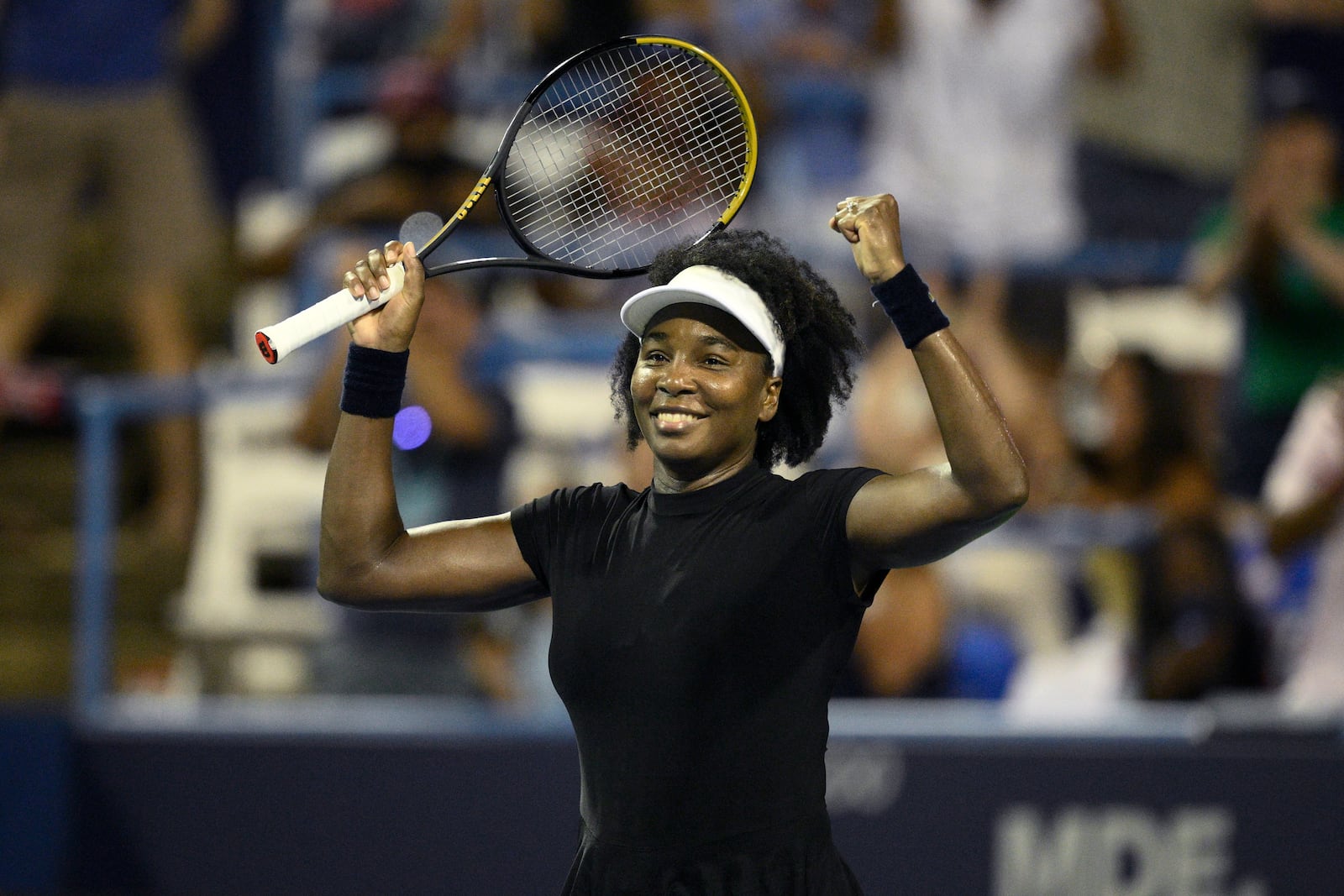 Venus Williams celebrates her win over Peyton Stearns during a match at the Citi Open tennis tournament Tuesday, July 22, 2025, in Washington. (AP Photo/Nick Wass)