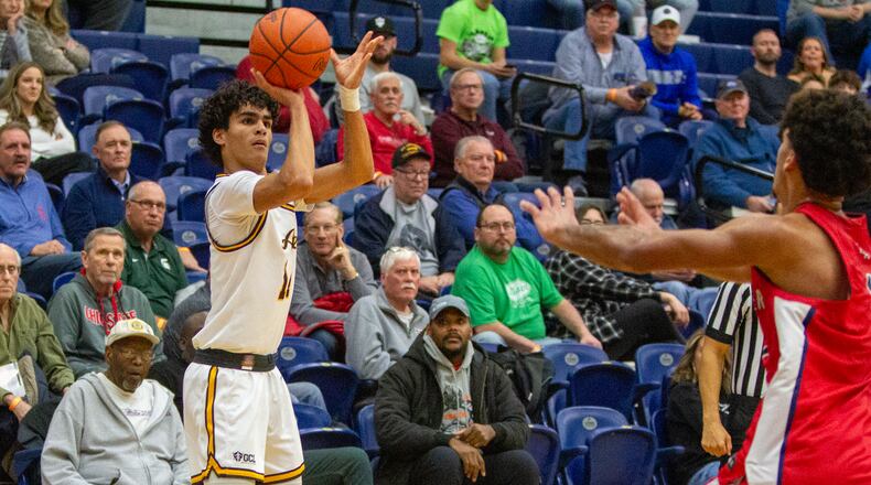 Alter guard R.J. Greer shoots a 3-pointer during a game at Flyin' To The Hoop last year.  Jeff Gilbert/CONTRIBUTED