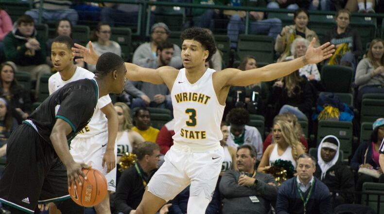 Wright State’s Mark Hughes defends against Green Bay last season. Allison Rodriguez/CONTRIBUTED