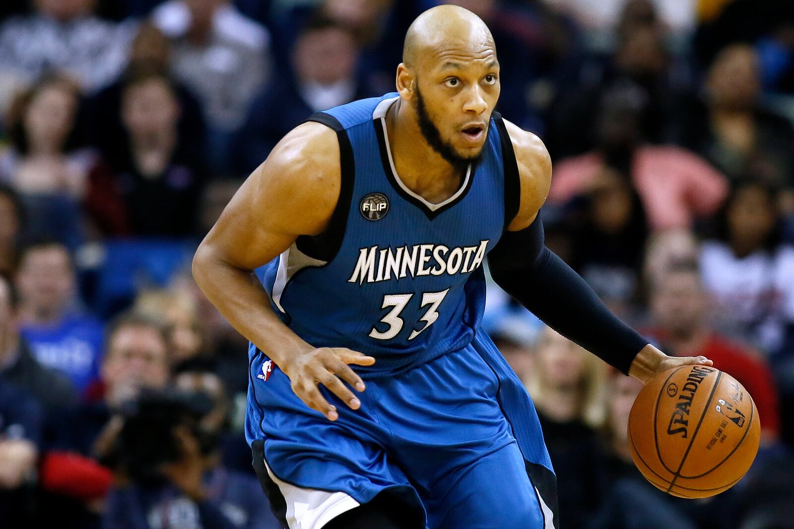FILE - Minnesota Timberwolves forward Adreian Payne (33) drives with the ball during the second half of an NBA basketball game, Feb. 27, 2016, in New Orleans. Former Michigan State basketball standout and NBA player Adreian Payne has died. He was 31. The Orange County Sheriff’s Office said deputies responded to a shooting Monday, May 9, 2022 when Payne was identified and taken to a hospital where he was pronounced dead. (AP Photo/Jonathan Bachman)