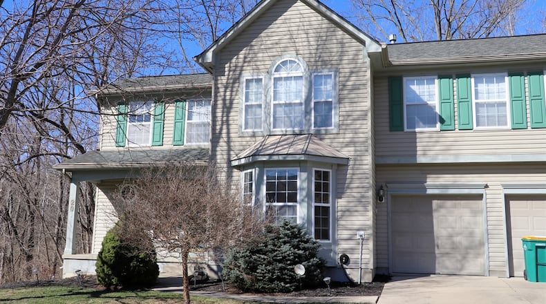 Listed for $379,500 by Beacon Home Group, the vinyl-sided, two-story home at 20 Steeplechase Drive has about 2,287 square feet of living space plus a full, finished walk-out basement. Contributed photos by Kathy Tyler