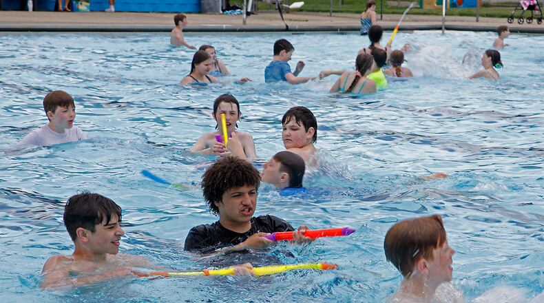 Tecumseh Middle School students got a chance to take an early dip in the New Carlisle Pool Wednesday, May 22, 2024. The pool officially opens to the public on Saturday for the Memorial Day weekend. BILL LACKEY/STAFF