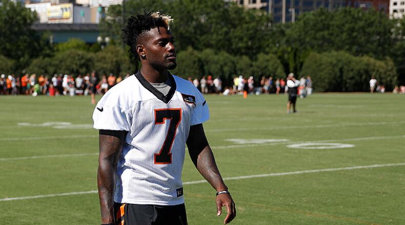 Cincinnati Bengals kicker Jonathan Brown walks the sidelines during an NFL football training camp, Saturday, July 29, 2017, in Cincinnati. (AP Photo/John Minchillo)