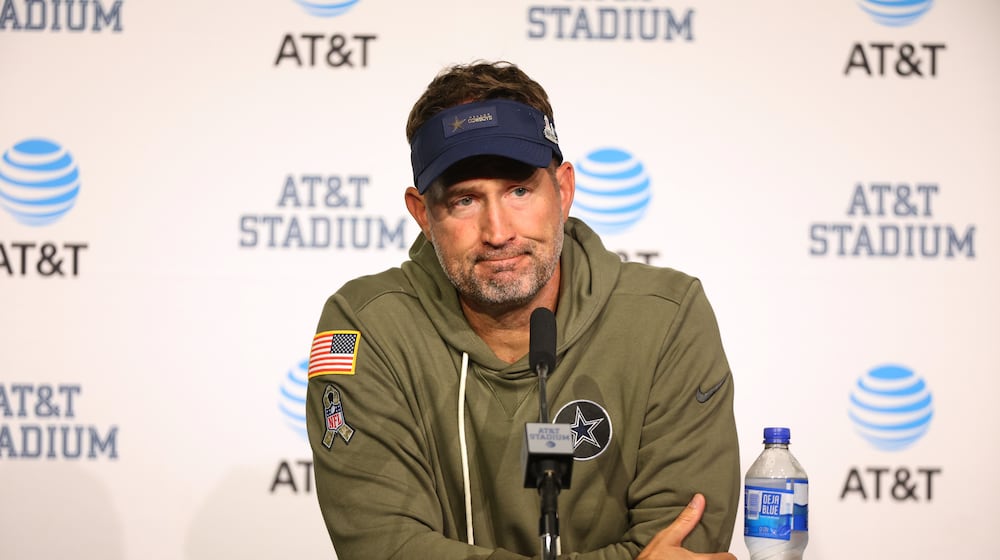 Dallas Cowboys head coach Brian Schottenheimer takes questions during a news conference after an NFL football game against the Arizona Cardinals Monday, Nov. 3, 2025, in Arlington, Texas. (AP Photo/Richard Rodriguez)
