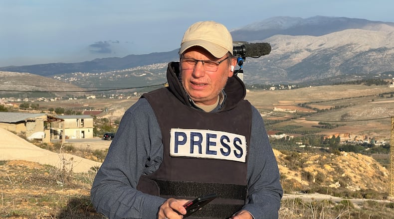 Hezbollah's al-Manar TV correspondent Ali Shoeib, who was killed in an Israeli strike in Jezzine along with other journalists on Saturday, March 28, 2026, is seen reporting in the town of Marjayoun, Wednesday, Nov. 22, 2024. (AP Photo/Hussein Malla)
