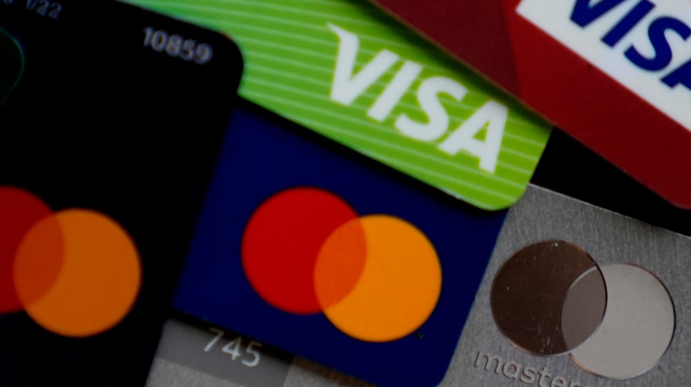 FILE - Visa and Mastercard credit cards are shown in Buffalo Grove, Ill., Feb. 8, 2024. (AP Photo/Nam Y. Huh, File)