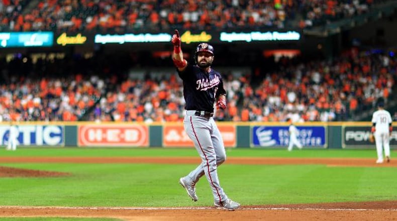 The Nationals' Adam Eaton celebrates his two-run home run against the Houston Astros during the eighth inning in Game Two of the 2019 World Series at Minute Maid Park on October 23, 2019 in Houston, Texas. (Photo by Mike Ehrmann/Getty Images)