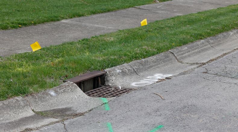 A gutter and sidewalk near the intersection of Bristol Street and Falmouth Avenue on Monday, April 14, 2025. JOSEPH COOKE/STAFF