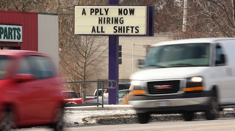 "Help Wanted' signs around Clark County Tuesday. BILL LACKEY/STAFF