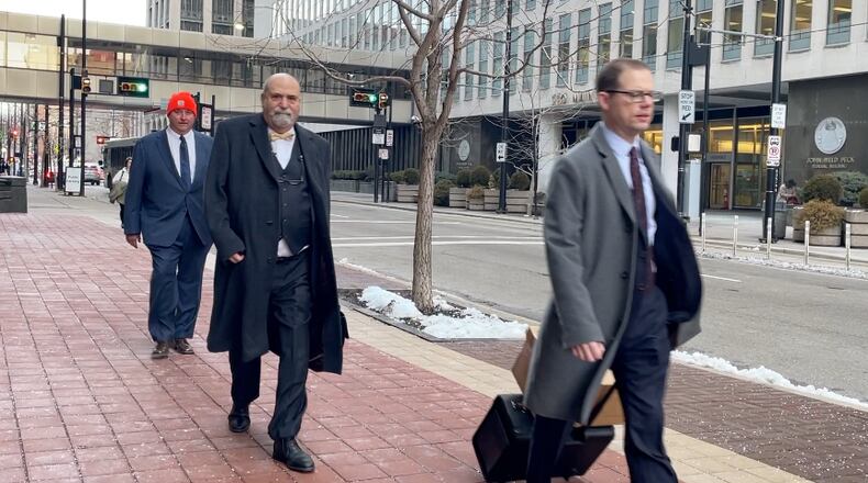Former Ohio House Speaker Larry Householder and his attorneys walk into federal court on Jan. 24, 2023. WCPO/CONTRIBUTED