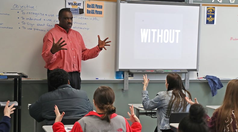 Springfield teacher Arlon Nash teaches American Sign Language to students at Springfield High School. BILL LACKEY/STAFF