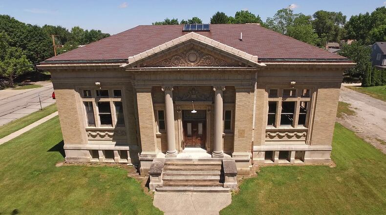 Officials are working to market the former Xenia Carnegie Library in hopes of finding a new tenant for the building, which has been vacant for 20 years. The library is located just a few blocks from the city center. TY GREENLEES / STAFF