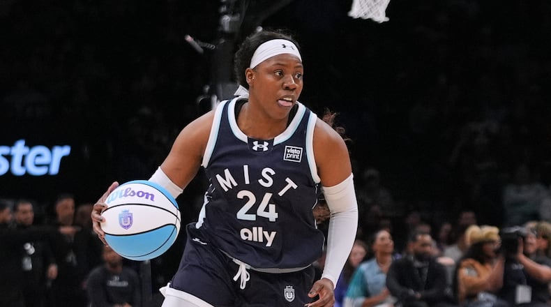 Mist BC wing Arike Ogunbowale (24) looks to pass during the second half of a semifinal in an Unrivaled 3-on-3 basketball game against Breeze BC, Monday, March 2, 2026, in New York. (AP Photo/Frank Franklin II)