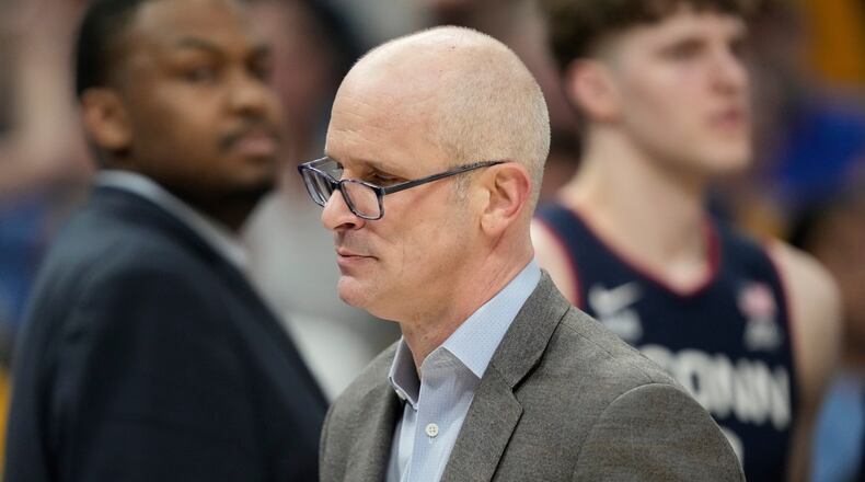 UConn head coach Dan Hurley exits the court after being ejected during an NCAA college basketball game against Marquette, Saturday, March 7, 2026, in Milwaukee. (AP Photo/Aaron Gash)