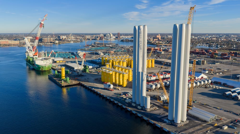 FILE - Wind turbine bases, generators and blades sit at The Portsmouth Marine terminal that is the staging area for Dominion Energy Virginia, which is developing Coastal Virginia Offshore Wind, Dec. 22, 2025, in Portsmouth, Va. (AP Photo/Steve Helber, File)