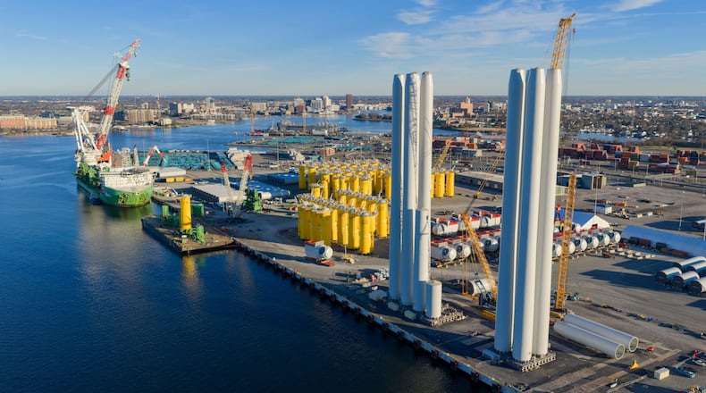 FILE - Wind turbine bases, generators and blades sit at The Portsmouth Marine terminal that is the staging area for Dominion Energy Virginia, which is developing Coastal Virginia Offshore Wind, Dec. 22, 2025, in Portsmouth, Va. (AP Photo/Steve Helber, File)