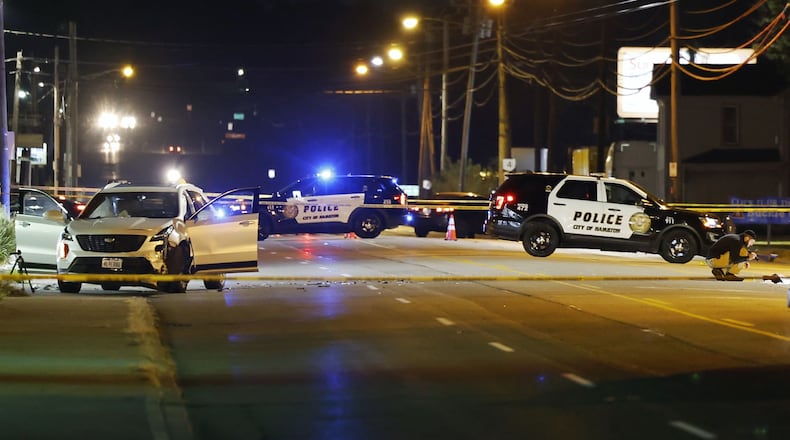 Hamilton police closed a portion of Ohio 4 near Fair Avenue after responding to reports of a car crash that became felonious assault on Saturday, Oct. 8, 2022. NICK GRAHAM/STAFF