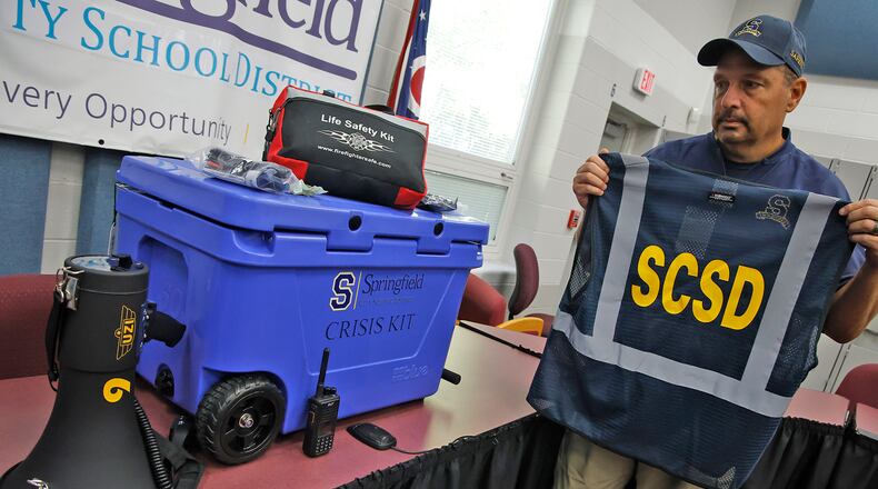 Dave Lyle, Operations Manager Safety and Security for Springfield City School District, shows some of the items in each school's Crisis Kits on Tuesday, Oct. 3, 2023. BILL LACKEY/STAFF