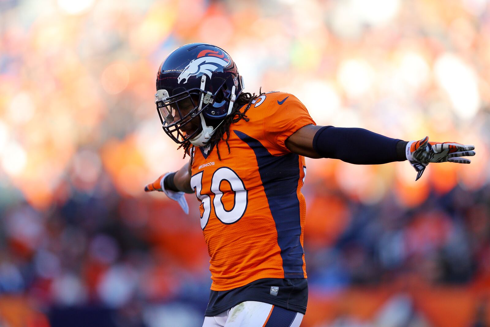 David Bruton #30 of the Denver Broncos celebrates during the AFC Divisional Playoff Game against the San Diego Chargers at Sports Authority Field at Mile High on January 12, 2014 in Denver, Colorado. (Photo by Justin Edmonds/Getty Images)