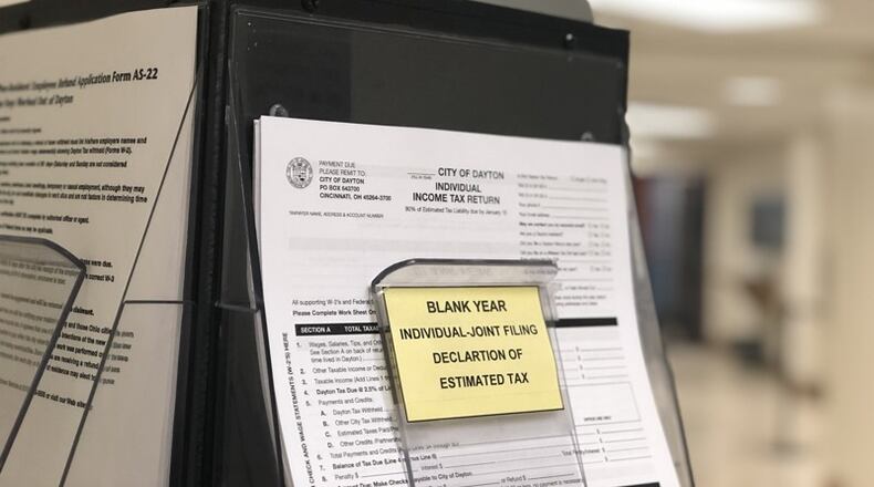 Local, state and federal taxes are due today, unless people have been granted an extension and don’t owe. CORNELIUS FROLIK / STAFF