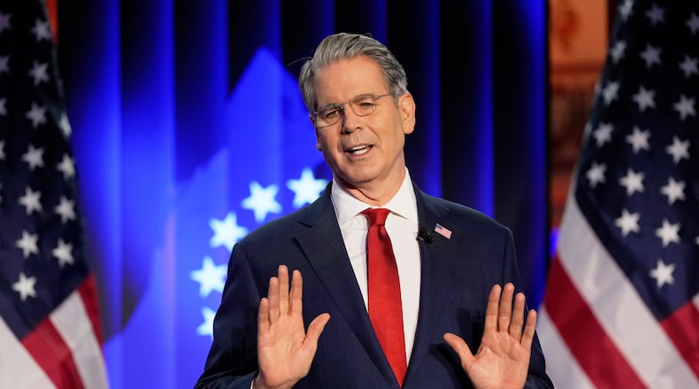 Scott Bessent, US Secretary of the Treasury, holds a speech at the USA House during the Annual Meeting of the World Economic Forum in Davos, Switzerland, Tuesday, Jan. 20, 2026. (AP Photo/Markus Schreiber)