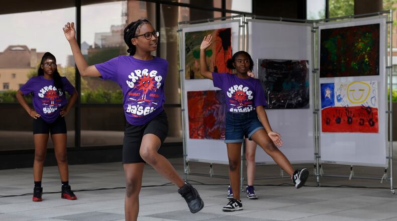 Kids dance as part of a performance with Project Jericho Summer Arts Camp on Friday, June 13, 2025, at Springfield City Plaza. JOSEPH COOKE/STAFF