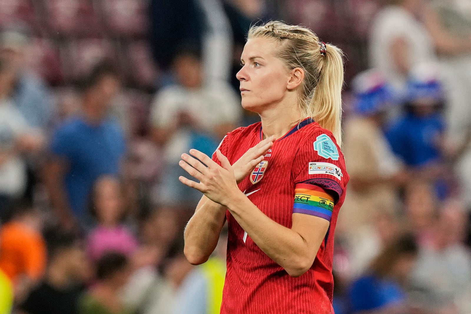 Norway's Ada Hegerberg reacts to fans on the pitch after losing the Women's Euro 2025 quarterfinals soccer match between Norway and Italy at Stade de Geneve in Geneva, Switzerland, Wednesday, July 16, 2025. (AP Photo/Martin Meissner)