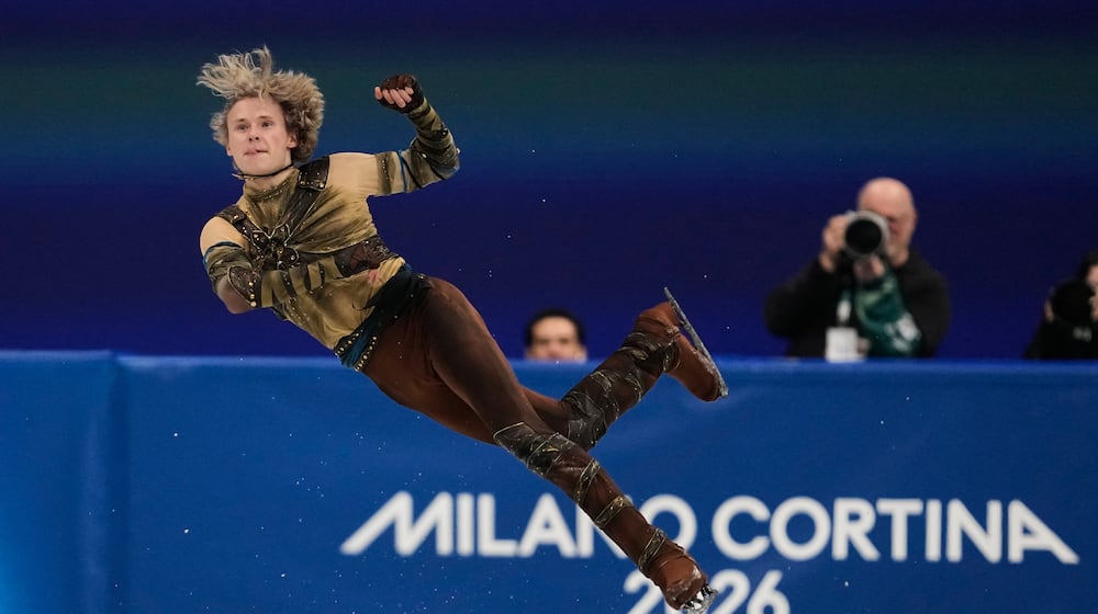 Ilia Malinin of the United States competes during the men's figure skating short program at the 2026 Winter Olympics, in Milan, Italy, Tuesday, Feb. 10, 2026. (AP Photo/Ashley Landis)