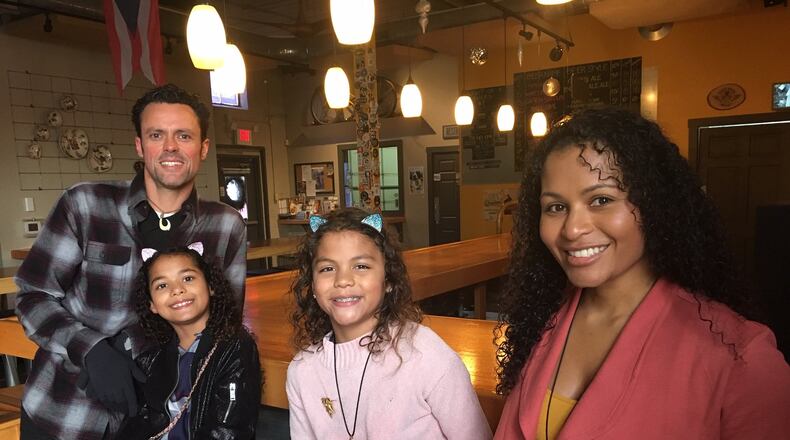 Antonio Molina, Jessica Yamamoto and twin daughters Sophia and Jessie are the new owners of Millworks, the four-acre industrial park between Walnut Street and the bike path in Yellow Springs. RICHARD WILSON/STAFF